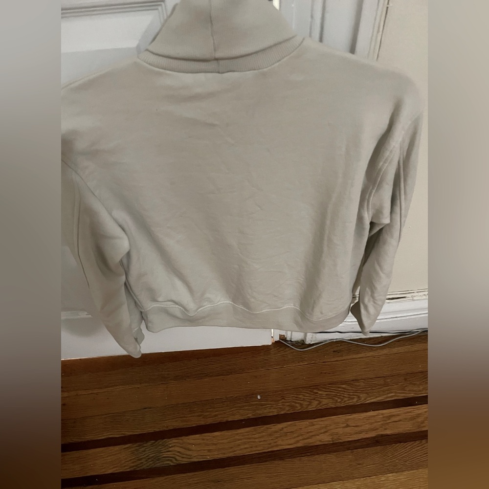 Tan women  turtle neck sweater